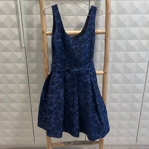 Bradgley Mischka above knee dress with pockets